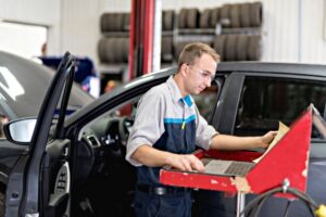 mechanic working on car